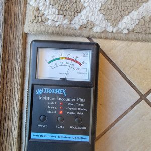 Moisture Meter detecting water under the ceramic tile